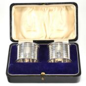 GEORVE V HALLMARKED SILVER CASED NAPKIN RINGS