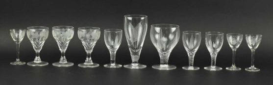ELEVEN 19TH & 20TH CENTURY ENGRAVED GLASS WINE GLASSES