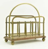 EARLY 20TH CENTURY OAK AND BRASS MAGAZINE RACK