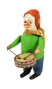 SCHUCO - 1930S TINPLATE GERMAN DRUMMING CLOWN CLOCKWORK FIGURE