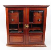 EARLY 20TH CENTURY GLAZED MAHOGANY TOBACCO TABLE TOP CABINET