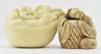 TWO 20TH CENTURY RESIN BUDDHA FIGURINES