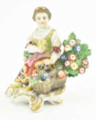 CHELSEA PORCELAIN - EARLY 20TH CENTURY PORCELAIN FLOWER GIRL