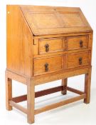 1920S JACOBEAN REVIVAL OAK BUREAU WRITING DESK