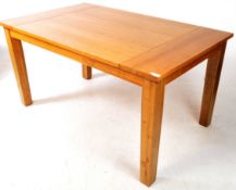 MANNER OF OAK FURNITURE LAND - OAK REFECTORY DINING TABLE