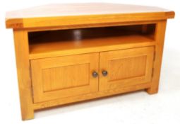 MANNER OF OAK FURNITURE LAND - BLOND OAK TV STAND CABINET