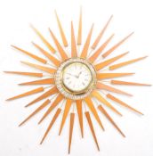 MID CENTURY ENGLISH ELEGANCE SUNBURST WALL CLOCK