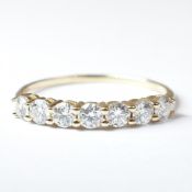 HALLMARKED 9CT GOLD & CZ SEVEN STONE RING