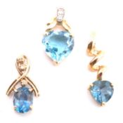 THREE HALLMARKED 9CT GOLD & TOPAZ NECKLACE PENDANTS