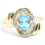 14CT GOLD TOPAZ & DIAMOND CROSSOVER RING