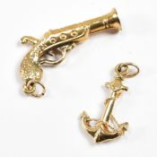 TWO 9CT GOLD CHARMS ANCHOR & PISTOL