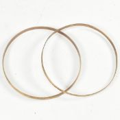 TWO HALLMARKED 9CT GOLD ENGRAVED BANGLES
