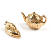 TWO HALLMARKED 9CT GOLD CHARMS IRON & TEAPOT