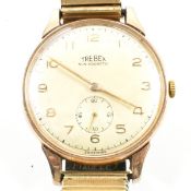 HALLMARKED 9CT GOLD TREBEX WRISTWATCH ON ROLLED GOLD STRAP