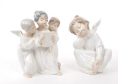 LLADRO - TWO HAND MADE SPANISH PORCELAIN CHERUB FIGURINES