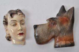 TWO EARLY 20TH CENTURY CERAMIC 1920S ART DECO WALL HANGINGS