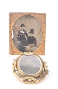 VICTORIAN MOURNING BROOCH AND PICTURE FRAME WITH VICTORIAN PHOTOGRAPHS