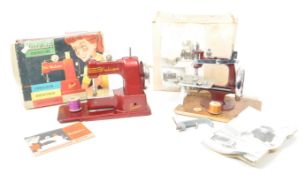 TWO VINTAGE MID CENTURY CHILD'S SEWING MACHINES
