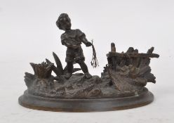 EARLY 20TH CENTURY BRASS CAST FISHERMAN BOY FIGURE