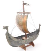 VINTAGE 1970S DANISH IRON ART BRONZE VIKING BOAT ON WOODEN STAND