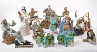 LARGE COLLECTION OF CHINESE MUD MEN FIGURINES