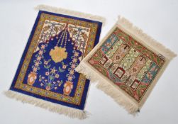 TWO MINIATURE PERSIAN SILK RUGS