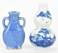 TWO QING DYNASTY CERAMIC SNUFF BOTTLES 清 青花鼻烟壶和蓝釉鼻烟壶