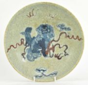 QING GE-TYPE BLUE AND WHITE UNDERGLAZE RED CHARGER 清 哥窑青花釉里红狮子滚绣球盘