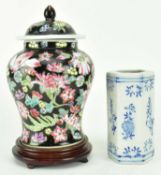20TH CENTURY FAMILLE NOIR LIDDED JAR AND BLUE AND WHITE INCENSE POT 黑底百花罐和青花香筒