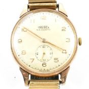 HALLMARKED 9CT GOLD TREBEX WRISTWATCH ON ROLLED GOLD STRAP