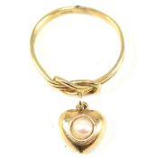 GOLD KNOT RING WITH PEARL SET HEART PENDANT