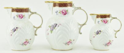 COALPORT - SET OF THREE GRADUATING CAUGHLEY CERAMIC MASK HEAD JUGS