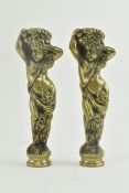 A PAIR OF 20TH CENTURY SOLID BRASS FIGURINES IN FORM OF CHERUBS