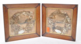 TWO FRAMED AND GLAZED PRINTS WITH SEAWEED AND SEASHELL WREATHS