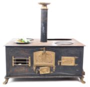 19TH CENTURY GERMAN TIN & BRASS CHILDREN'S STOVE