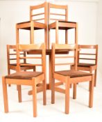 MID CENTURY DANISH INFLUENCED DINING TABLE AND SIX CHAIRS