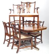 SIX 20TH CENTURY MAHOGANY CHIPPENDALE REVIVAL CHAIRS & DINING TABLE