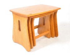 LUCIAN ERCOLANI - ERCOL - CONTEMPORARY NEST OF ELM WOOD GRADUATING TABLES