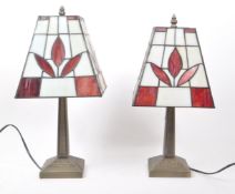 TIFFANY MANNER - PAIR OF STAINED AND LEADED GLASS TABLE LAMPS