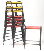 BRITISH MODERN DESIGN - A SET OF EIGHT VINTAGE 20TH CENTURY PLASTIC STACKING STOOLS