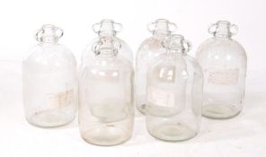 COLLECTION OF SIX VINTAGE 1980S DEMIJOHN GLASS BOTTLES