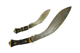 TWO VINTAGE KUKRI KNIVES