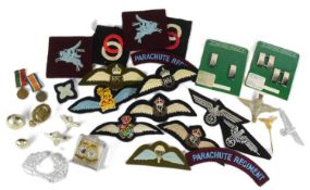 COLLECTION OF ASSORTED MILITARY BADGES & PATCHES