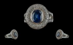 Ladies 18ct White Gold Sapphire and Diamond Set Cluster Ring, marked 750 to interior of shank, the