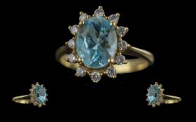Ladies Attractive 18ct Gold Aquamarine and Diamond Set Ring, flower head design, marked 18ct to