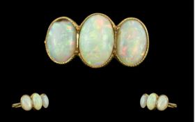 Antique Period Pleasing 18ct Gold 3 Stone Opal Set Ring, circa 1900. The well-matched oval shaped