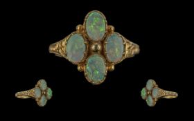 Attractive Ladies 9ct Gold Opal Set Ring with a pleasing, ornate setting, full hallmark to