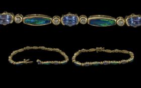 A Fine Quality Ladies 14ct Gold Opal Diamond and Amethyst Set Bracelet. Marked 14ct - 585.