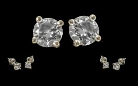 Pair of 18ct White Gold Diamond Set Earrings. Marked 750 - 18ct. The Round Brilliant Cut DIamonds of