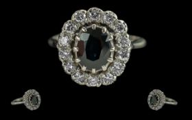 Ladies 18ct White Gold Diamond and Sapphire Cluster Ring. Full Hallmark to Interior of Shank.